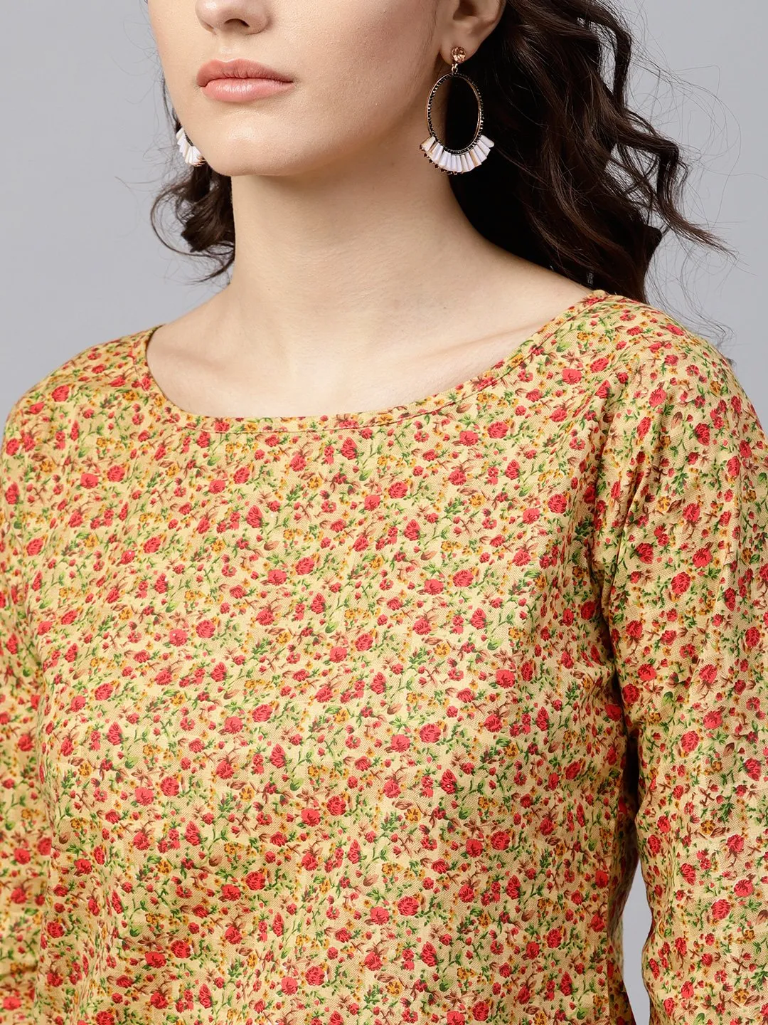 Multi Printed Top With Round Neck And 3/4 Flared Sleeves